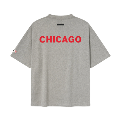 Fear of God Essentials Cubs 90's Tee Concrete Heather